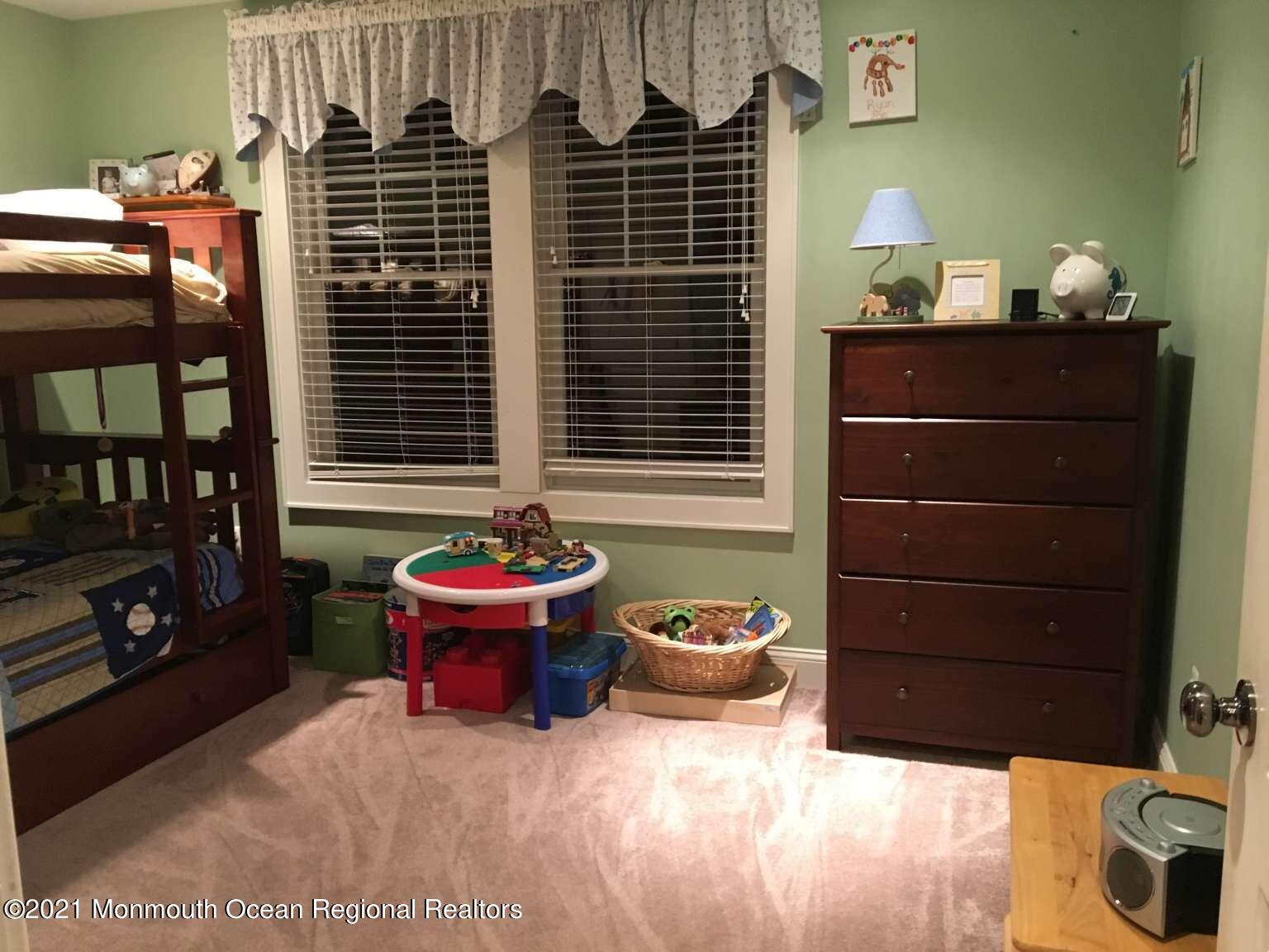 341 Oak Glen Road Howell, NJ 07731 - Photo 18 of 19 a bathroom with a sink and a potted plant