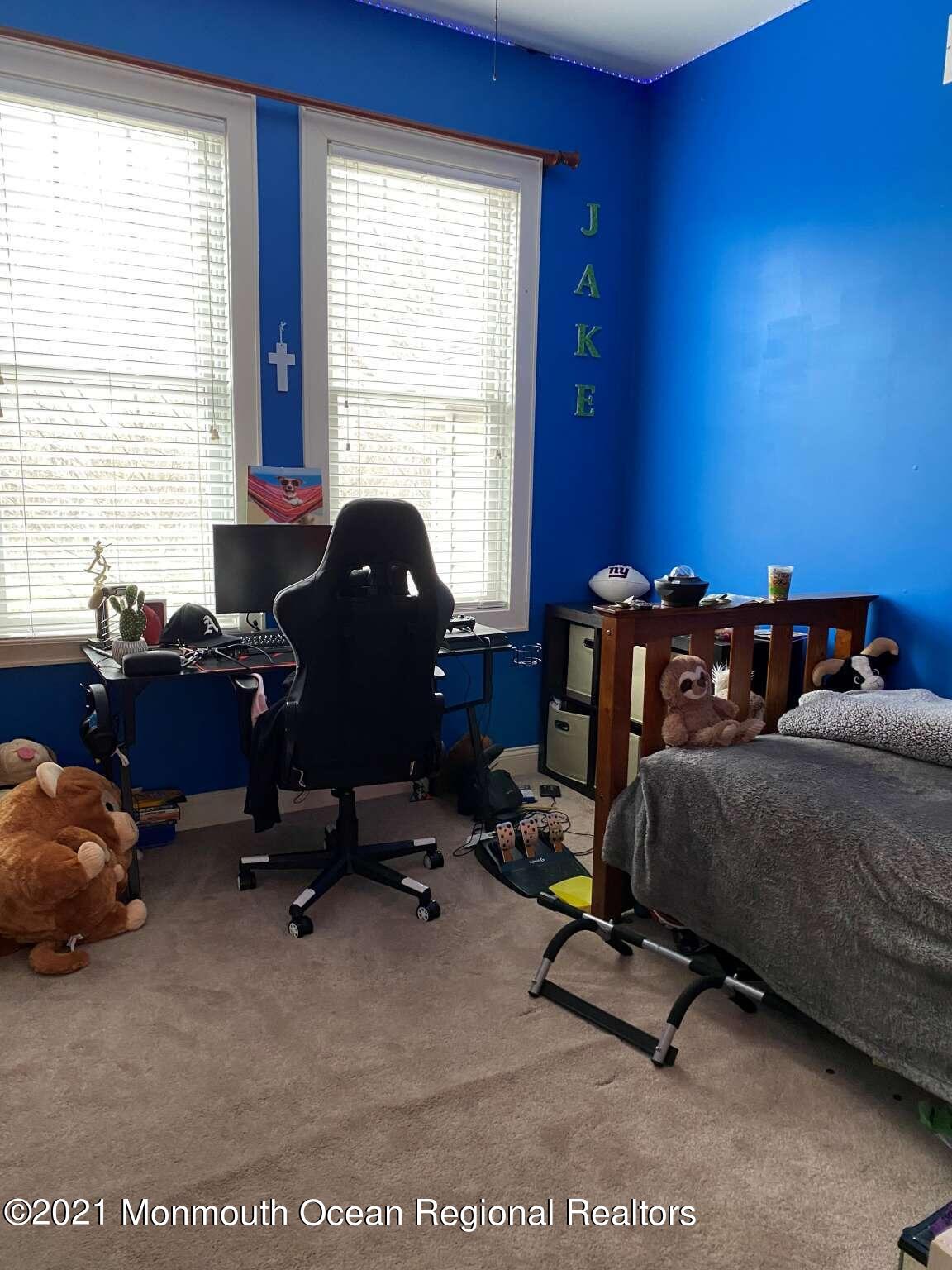 341 Oak Glen Road Howell, NJ 07731 - Photo 19 of 19 a view of a workspace with furniture and a window