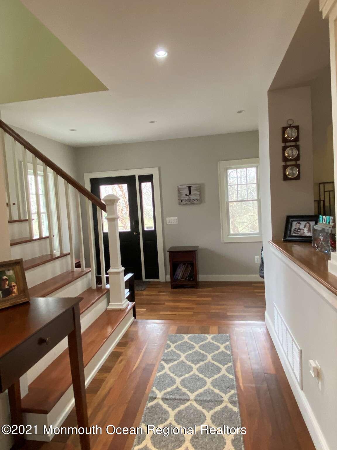 341 Oak Glen Road Howell, NJ 07731 - Photo 5 of 19 a view of a room with gym equipment