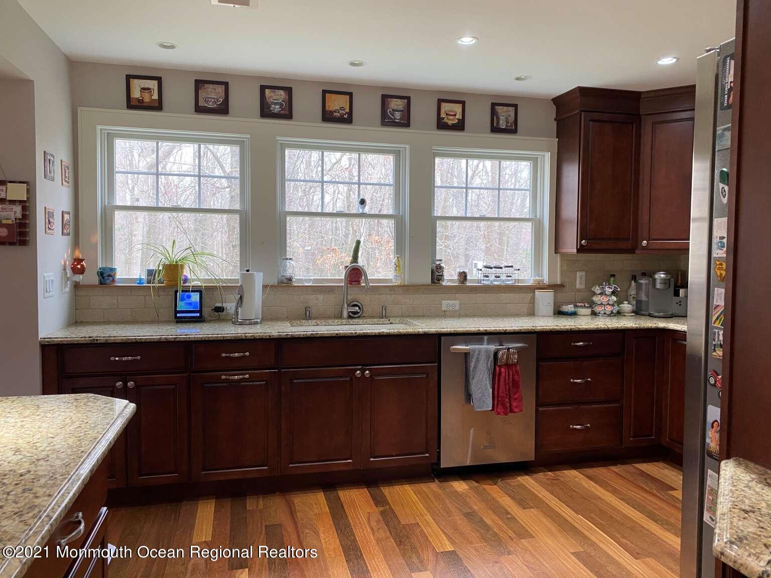 341 Oak Glen Road Howell, NJ 07731 - Photo 10 of 19 a kitchen with a sink and a window