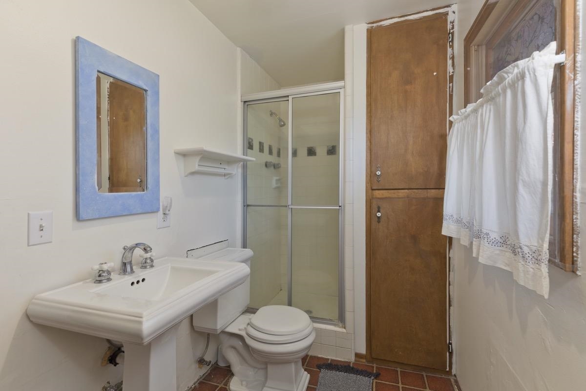 2030 Old Mammoth Road Mammoth Lakes, CA 93546 - Photo 25 of 46 a bathroom with a sink toilet and shower