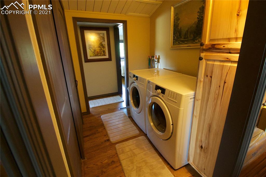 2160 Old North Gate Road Colorado Springs, CO 80921 - Photo 17 of 34 a utility room with dryer and washer