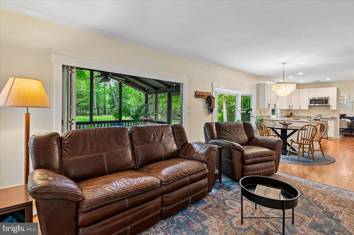 1430 Bay Head Road Annapolis, MD 21409 - Photo 11 of 94 Family room w/door to screened porch