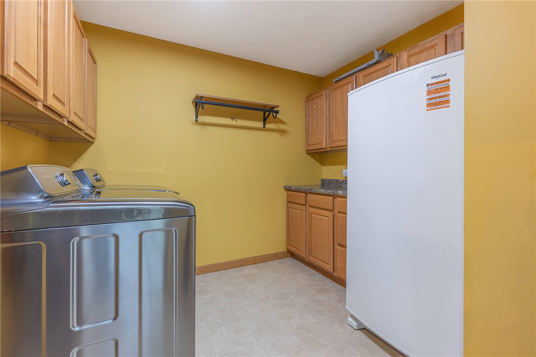 2645 Vance Road St. Paris, OH 43072 - Photo 22 of 35 Functional utility room with efficient appliances and ample storage space for organization.