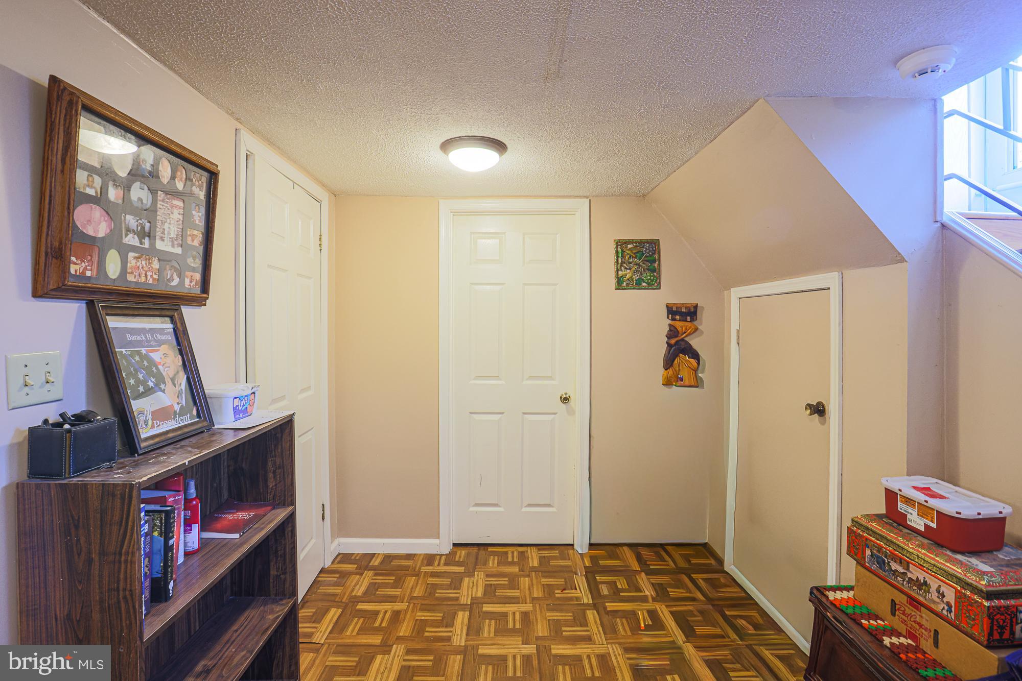 8205 Arrowhead Road Baltimore, MD 21208 - Photo 15 of 32 a view of an entryway with wooden floor