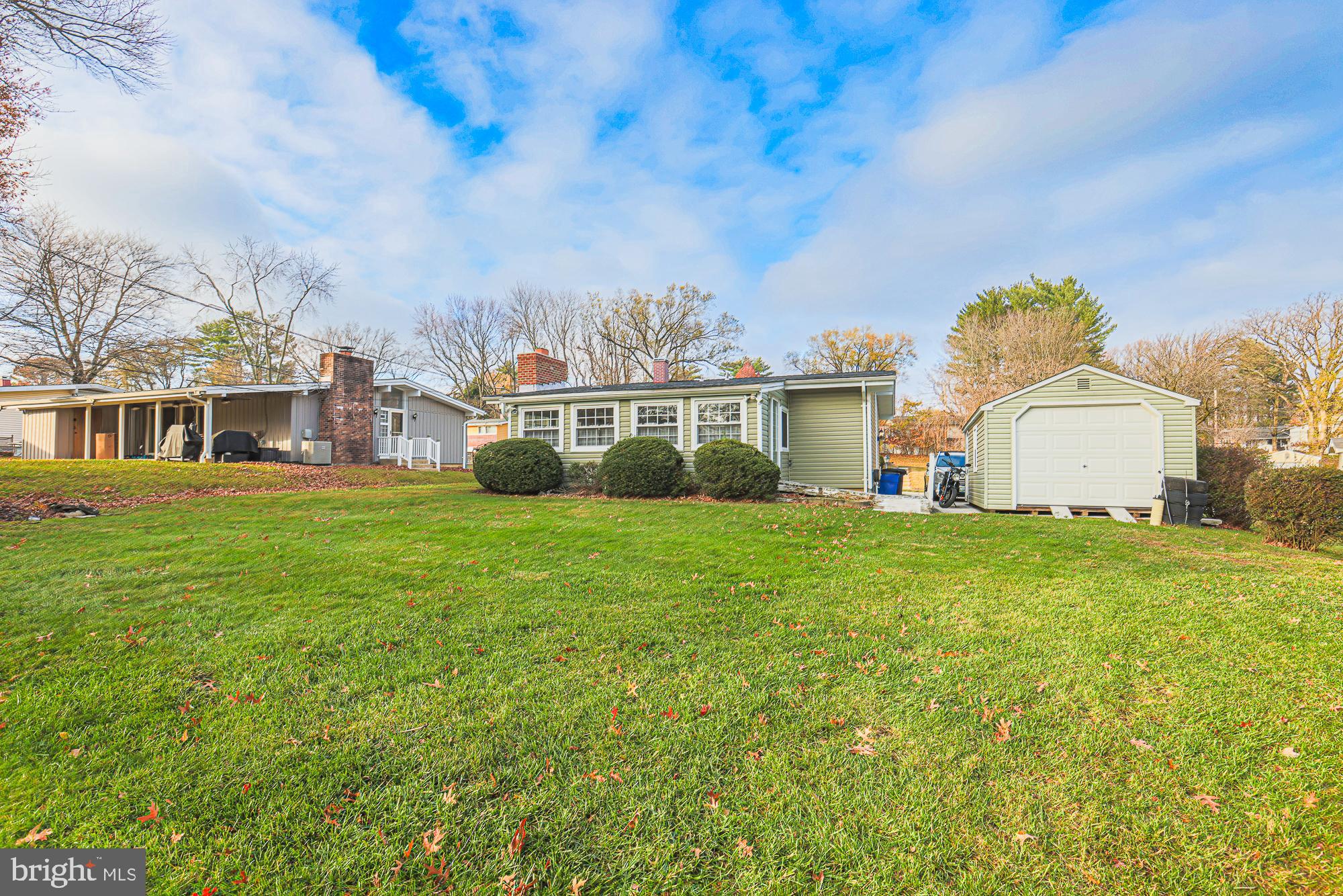 8205 Arrowhead Road Baltimore, MD 21208 - Photo 8 of 32 a view of a house with a back yard