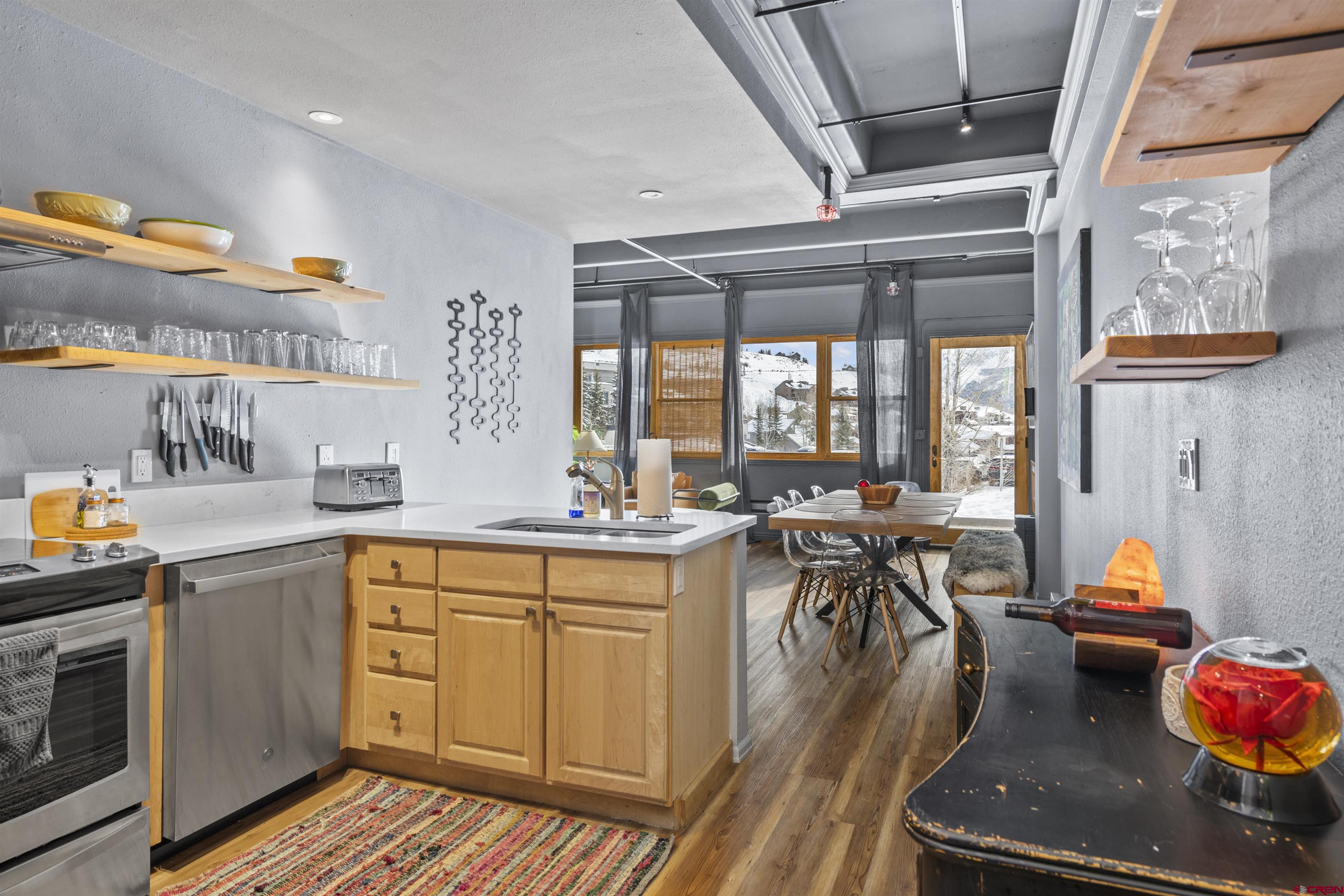 11 Snowmass Road, Unit 33 Crested Butte, CO 81225 - Photo 3 of 34 a kitchen with lots of counter top space