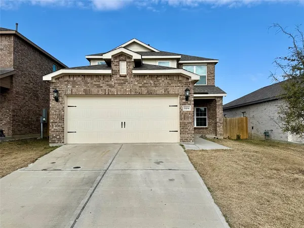 a front view of a house with a space