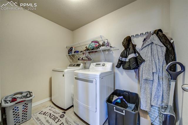11353 Avena Road Peyton, CO 80831 - Photo 33 of 46 Laundry room with washing machine and dryer (which will stay)