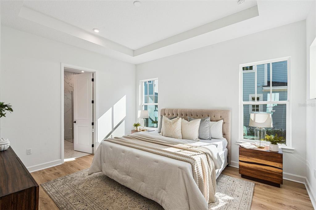 2006 Beach Terrace Celebration, FL 34747 - Photo 12 of 31 a bedroom with a bed and a window