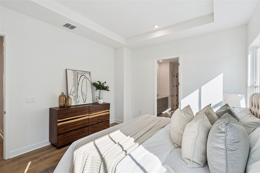 2006 Beach Terrace Celebration, FL 34747 - Photo 13 of 31 a bedroom with two beds and a couch