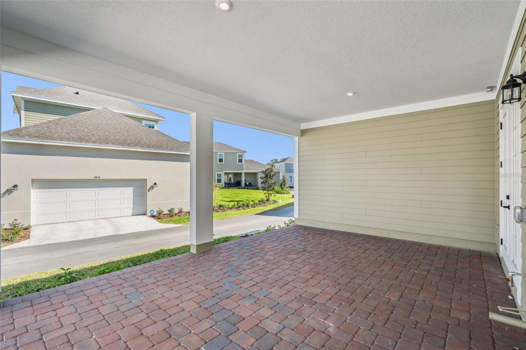 2006 Beach Terrace Celebration, FL 34747 - Photo 19 of 31 a view of porch with a floor to ceiling window and yard