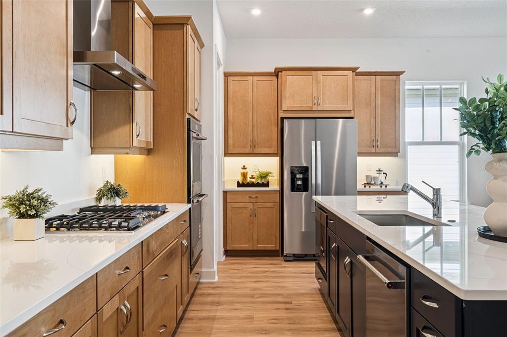 2006 Beach Terrace Celebration, FL 34747 - Photo 9 of 31 a kitchen with a sink stove and refrigerator