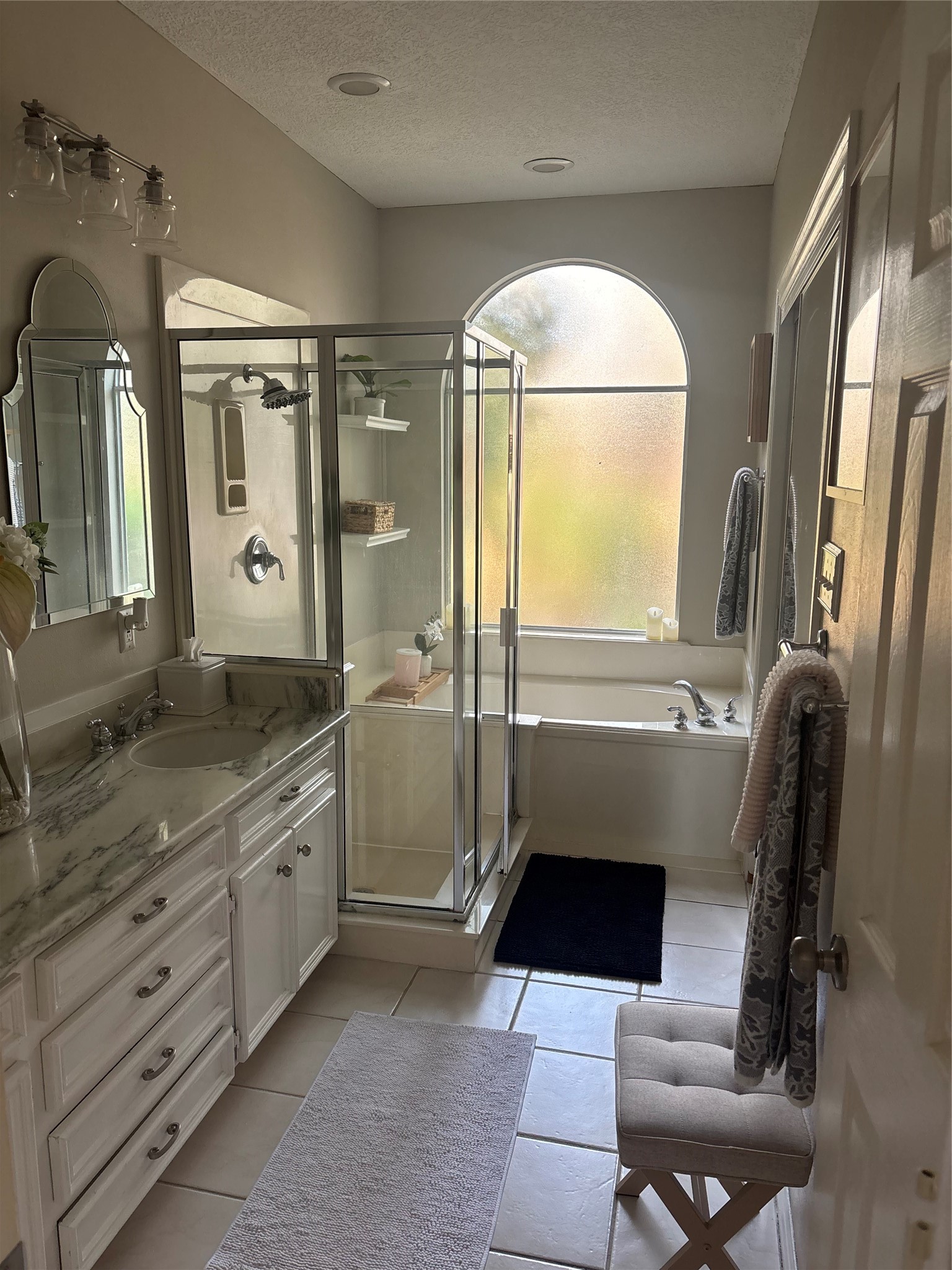 8915 Herts Road Spring, TX 77379 - Photo 6 of 7 a bathroom with a double vanity sink toilet and mirror