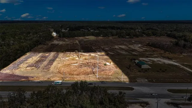 a view of lot of water heater and wooden floor