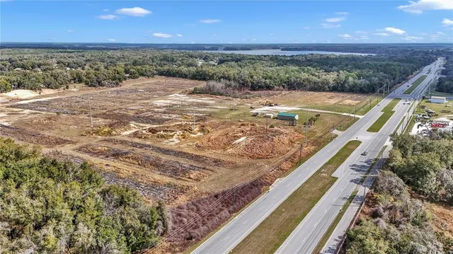 a view of an ocean beach and mountain