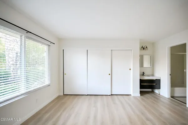a view of livingroom with furniture and window