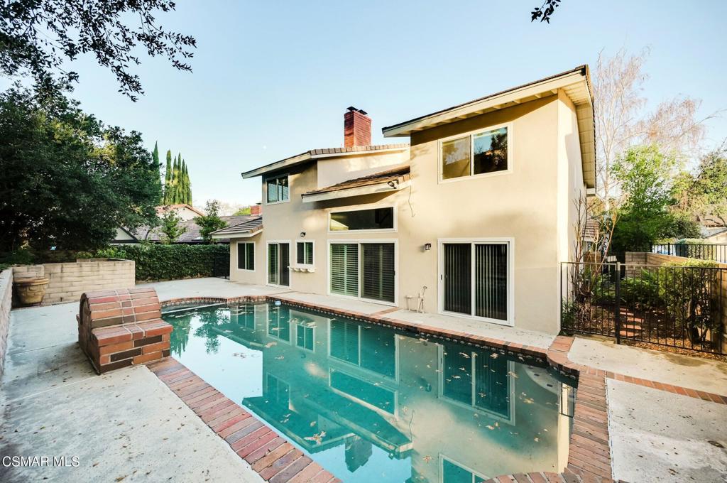 681 Triunfo Canyon Road Westlake Village, CA 91361 - Photo 22 of 23 a front view of a house with garden