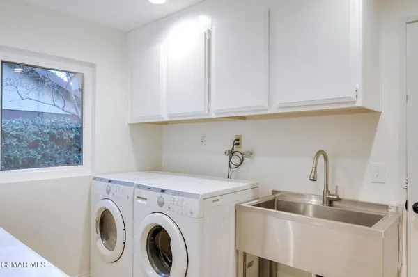 a view of kitchen and sink