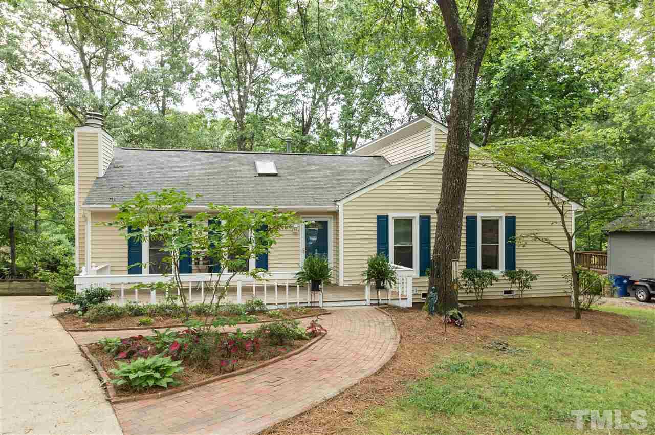 1421 Fairway Ridge Drive Raleigh, NC 27606 - Photo 1 of 19 front view of a house with a yard