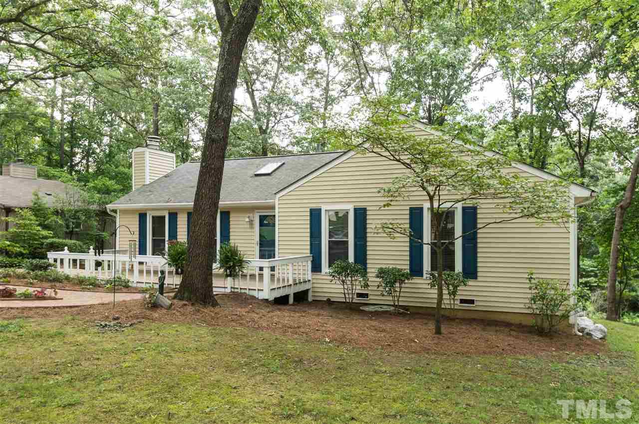 1421 Fairway Ridge Drive Raleigh, NC 27606 - Photo 19 of 19 a front view of a house with garden