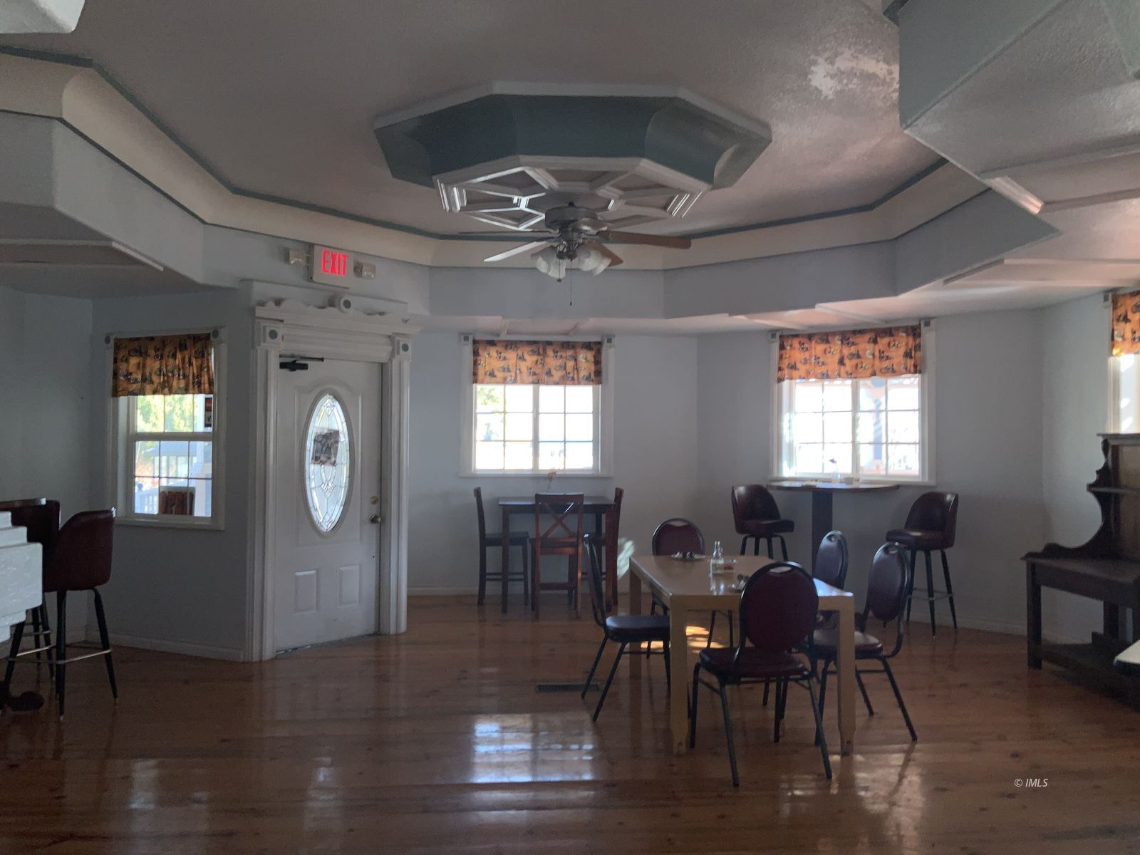 127 North Edwards Street Independence, CA 93526 - Photo 11 of 33 a view of a dining room with furniture window and wooden floor
