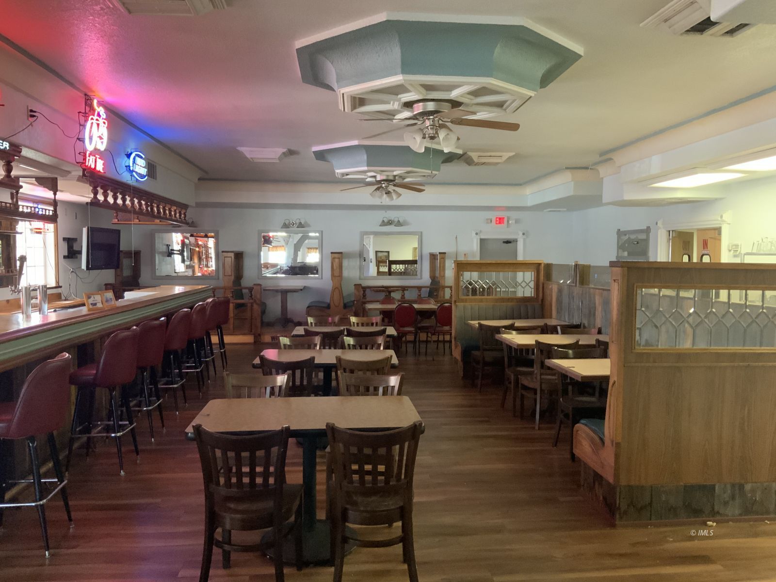 127 North Edwards Street Independence, CA 93526 - Photo 16 of 33 a view of a dining room with furniture and a chandelier