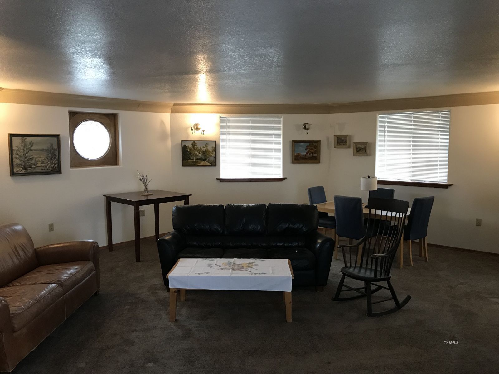 127 North Edwards Street Independence, CA 93526 - Photo 25 of 33 a living room with furniture a rug and a window