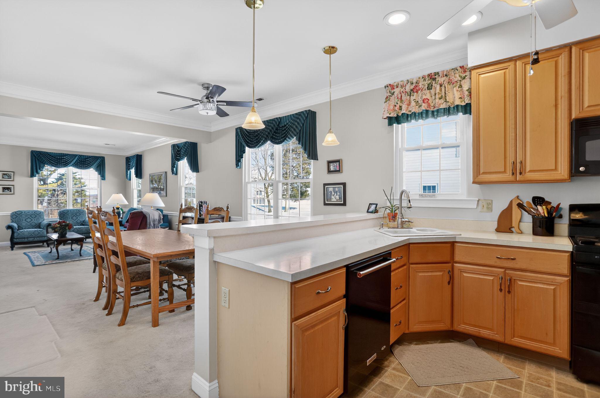 417 Ruth Court Harleysville, PA 19438 - Photo 11 of 28 a kitchen with a table chairs sink and cabinets
