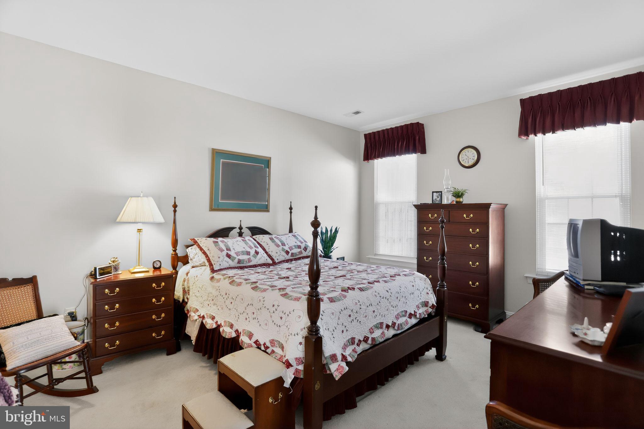 417 Ruth Court Harleysville, PA 19438 - Photo 18 of 28 a bedroom with a bed and a couch