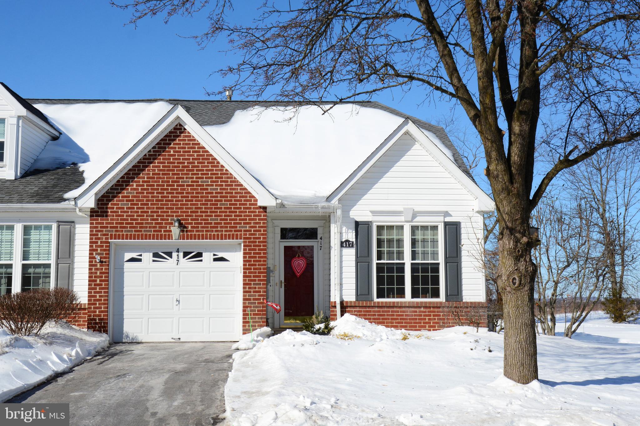 417 Ruth Court Harleysville, PA 19438 - Photo 2 of 28 a view of a house with a yard covered in snow