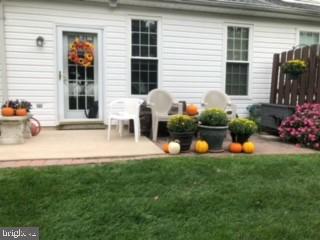 417 Ruth Court Harleysville, PA 19438 - Photo 28 of 28 a front view of a house with patio and fire pit