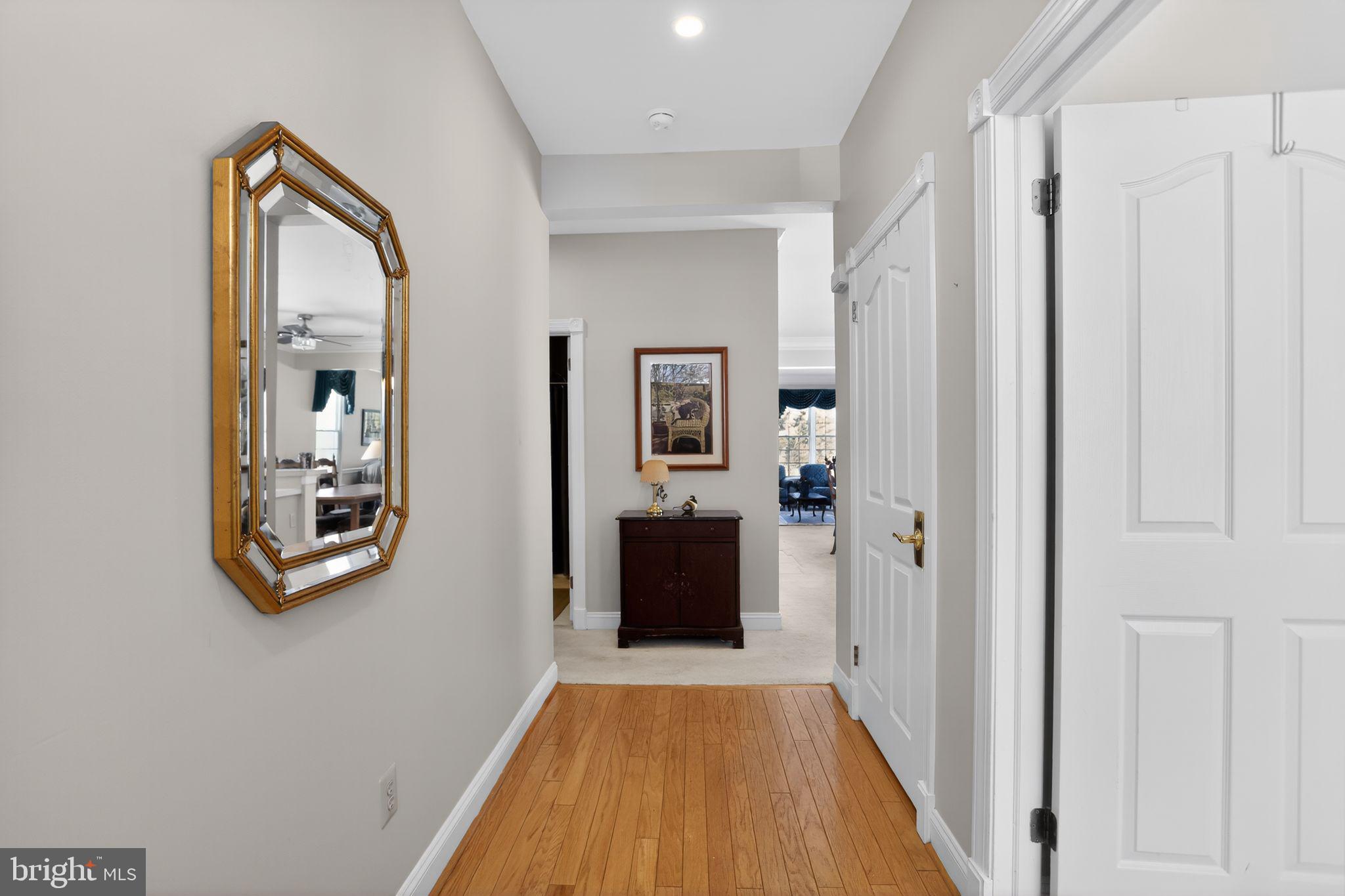417 Ruth Court Harleysville, PA 19438 - Photo 6 of 28 a view of a hallway with wooden floor and windows