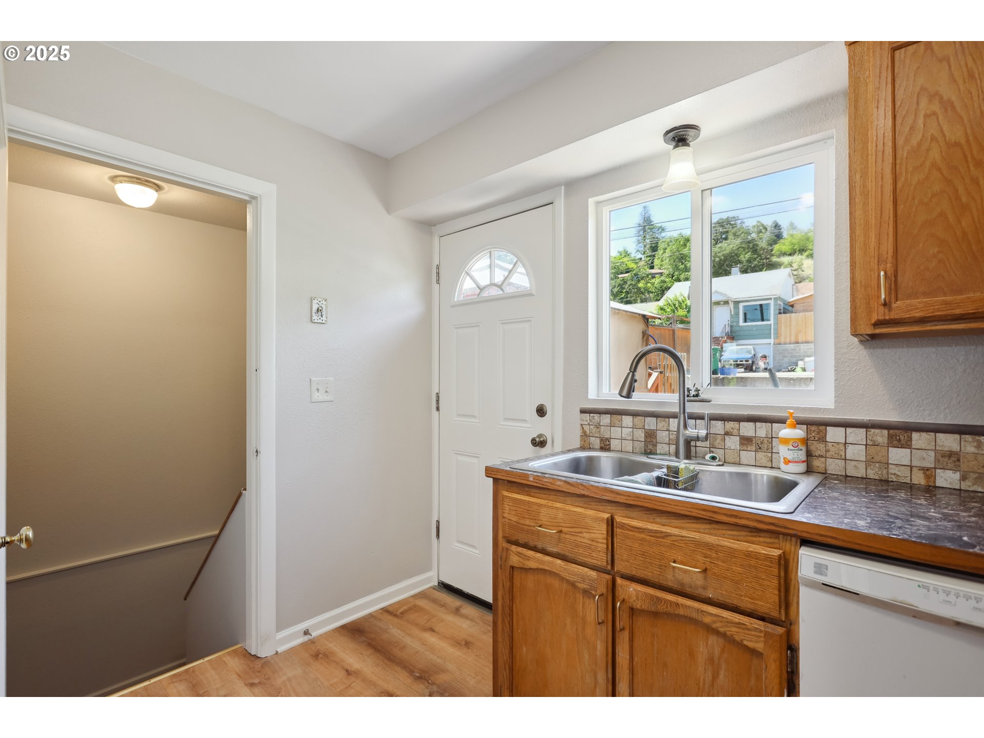 722 East 14th Street The Dalles, OR 97058 - Photo 12 of 43 a bathroom with a sink and a window