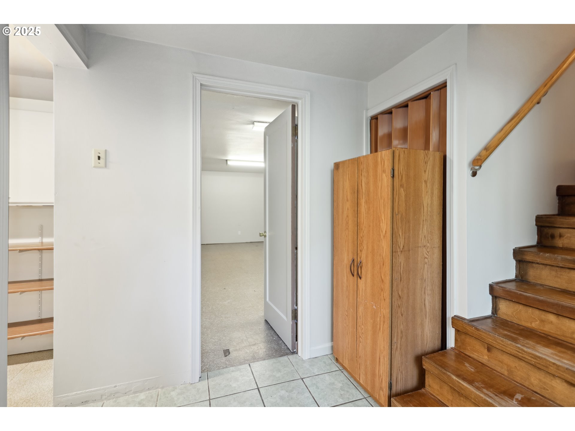 722 East 14th Street The Dalles, OR 97058 - Photo 24 of 43 a view of a bedroom from the hallway