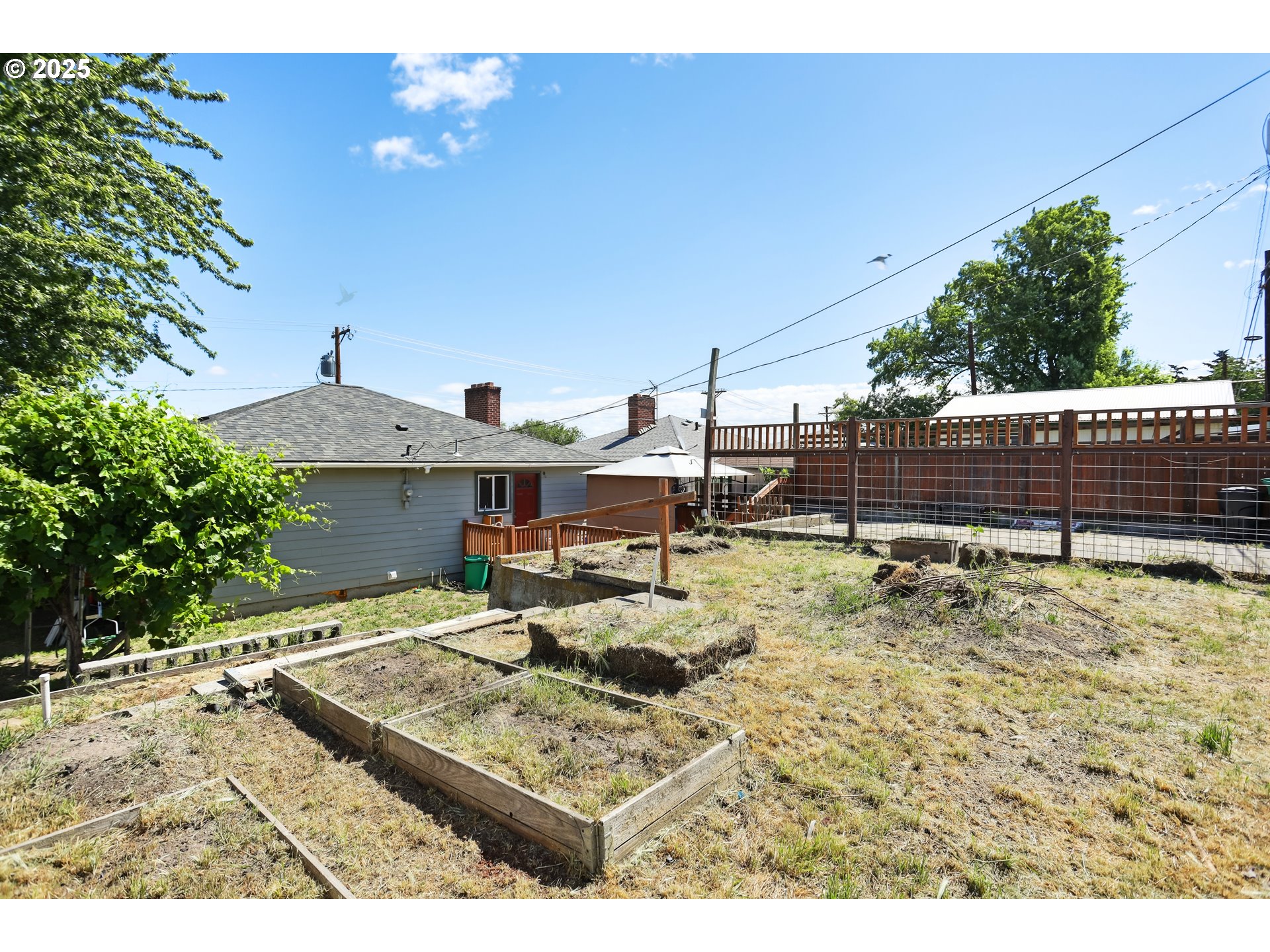 722 East 14th Street The Dalles, OR 97058 - Photo 38 of 43 a view of a backyard with sitting area