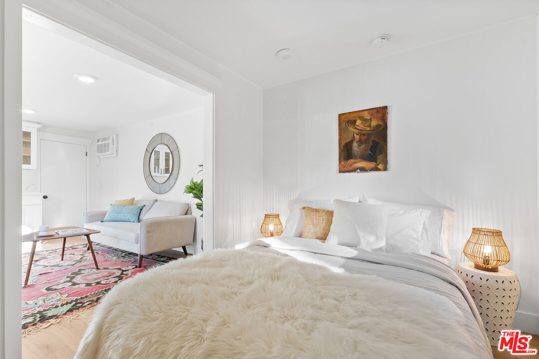 20939 Hillside Drive Topanga, CA 90290 - Photo 34 of 53 a bedroom with bed and window