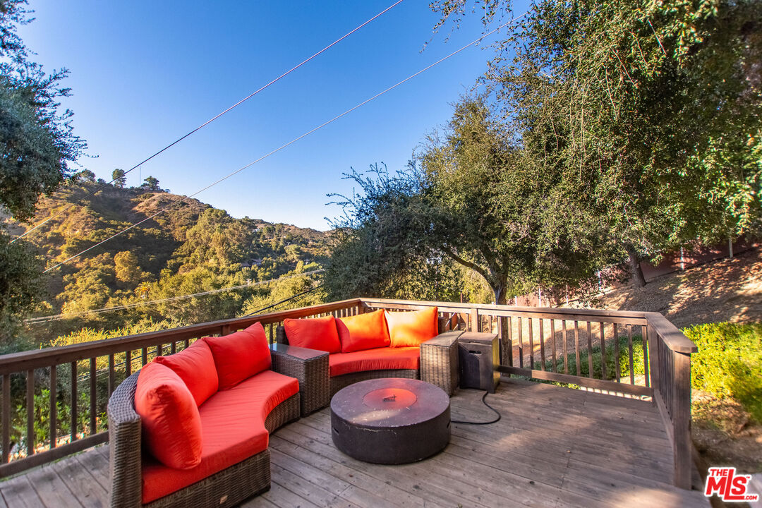 20939 Hillside Drive Topanga, CA 90290 - Photo 39 of 53 a view of a balcony with outdoor seating