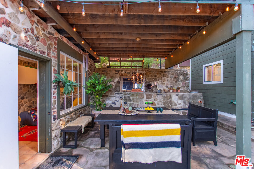 20939 Hillside Drive Topanga, CA 90290 - Photo 41 of 53 a outdoor living space with furniture and a table
