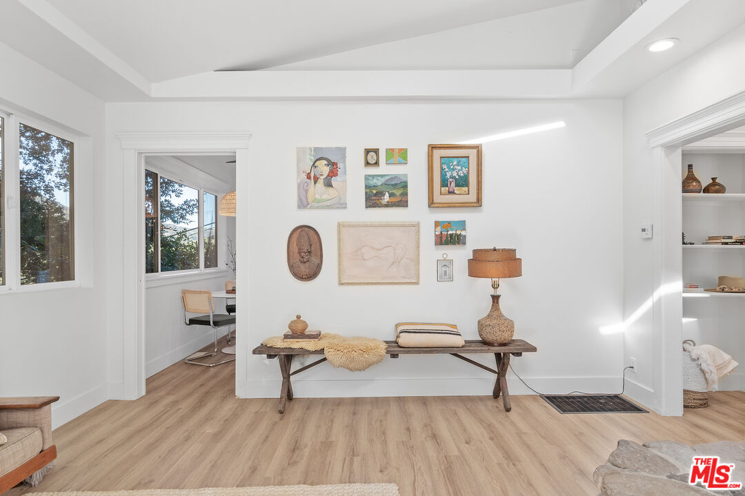 20939 Hillside Drive Topanga, CA 90290 - Photo 6 of 53 a living room with furniture a window and a table