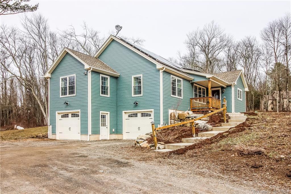 8 Jerusalem Road Windham, CT 06280 - Photo 1 of 1 a view of a house with a patio