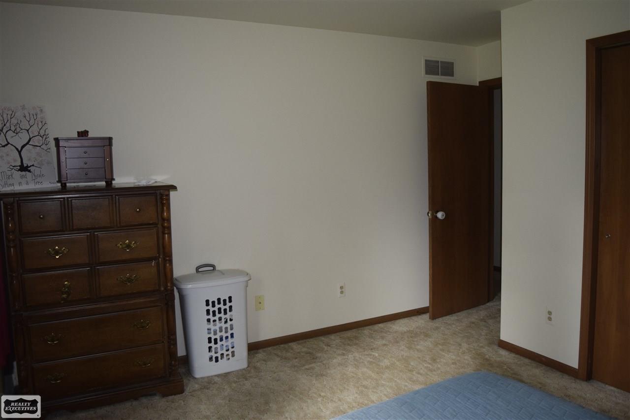 78409 Romeo Plank Road Armada, MI 48005 - Photo 21 of 32 Master Bedroom