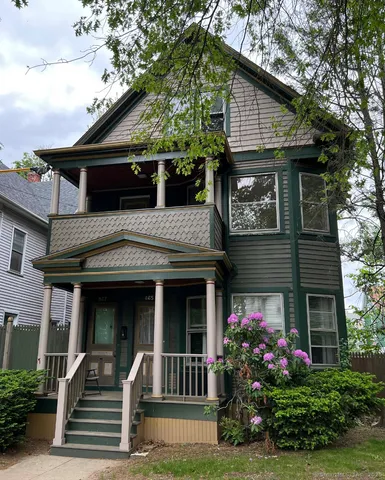 a front view of a house with a porch