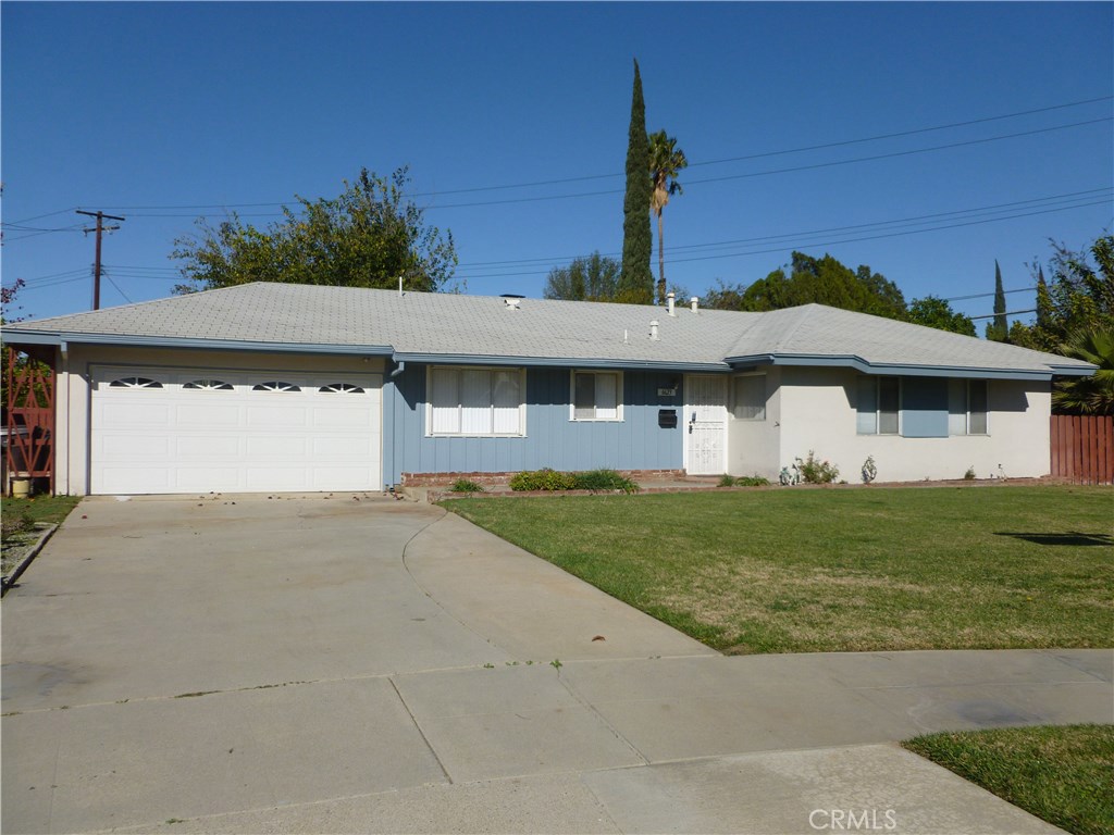 6623 Eva Place Riverside, CA 92504 - Photo 1 of 1 a front view of a house with a yard