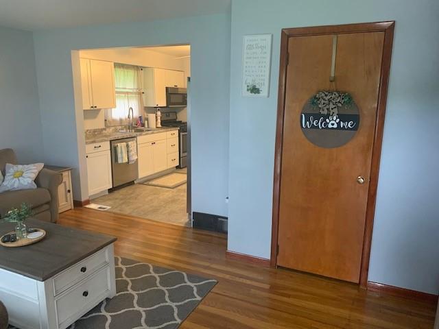 165 Ridge Avenue Freedom, PA 15042 - Photo 11 of 19 a view of a kitchen counter space and wooden floor
