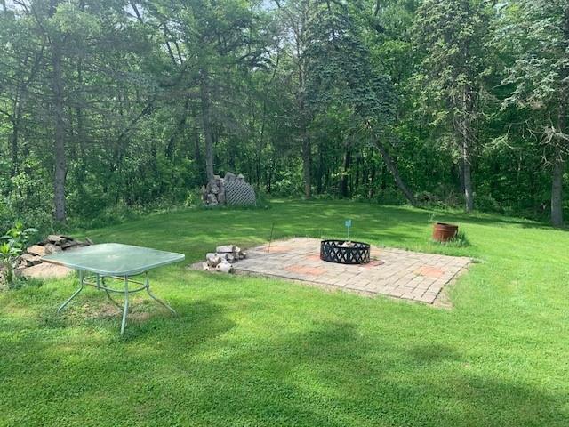 165 Ridge Avenue Freedom, PA 15042 - Photo 18 of 19 a view of a backyard with table and chairs plants and large trees