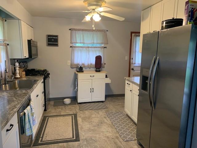 165 Ridge Avenue Freedom, PA 15042 - Photo 6 of 19 a kitchen with a sink cabinets and stainless steel appliances