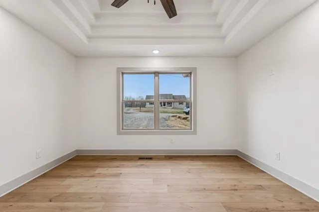 a view of a room that has a window in it