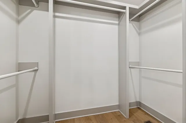 a view of an empty walk in closet