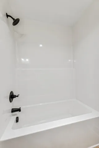 a bathroom with a bathtub